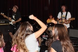 Courtney Barnett, Steph Hughes and Jen Cloher peforming at the Ainslie Art Centre for Girls Rock! Canberra.