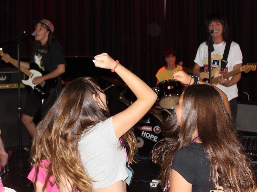 Courtney Barnett, Steph Hughes and Jen Cloher peforming at the Ainslie Art Centre for Girls Rock! Canberra.