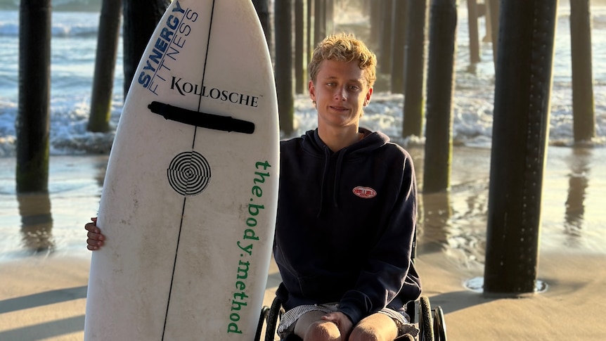 Teenager Kai Colless wins adaptive surfing world title in