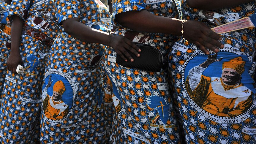 Catholic faithfuls in Benin's city of Cotonou welcome Pope Benedict XVI to Africa.