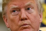 US President Donald Trump listens during his meeting with Japanese Prime Minister Shinzo Abe