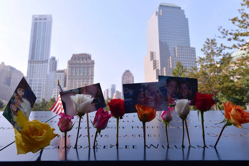 Flowers and photos at September 11 tribute