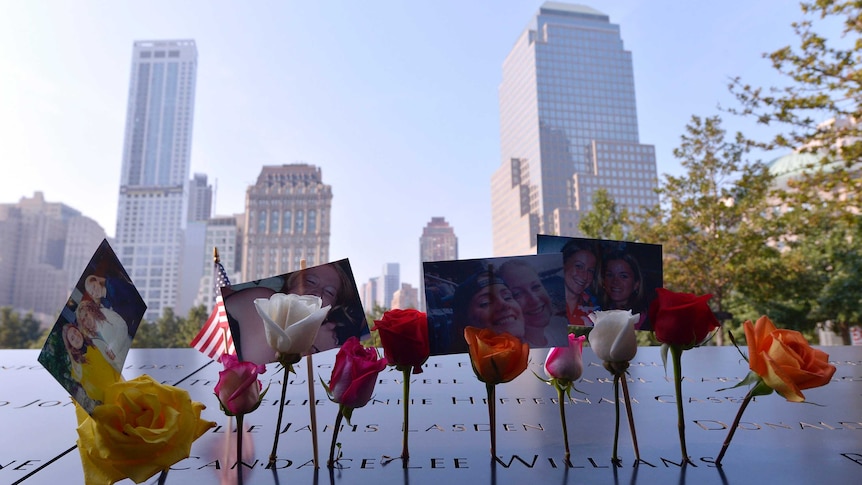 Flowers and photos at September 11 tribute