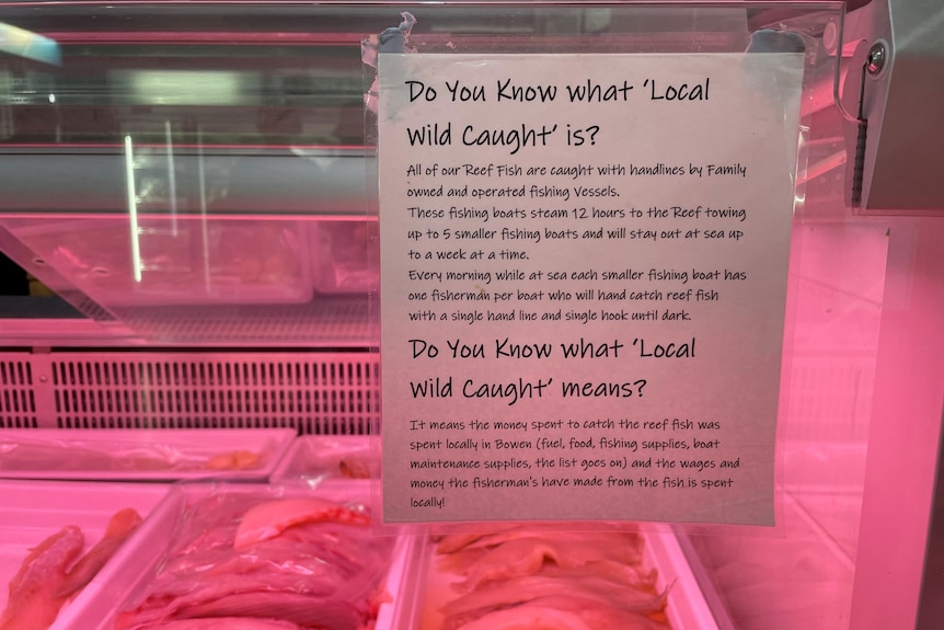 a sign says 'do you know what local wild caught is?' on the cou