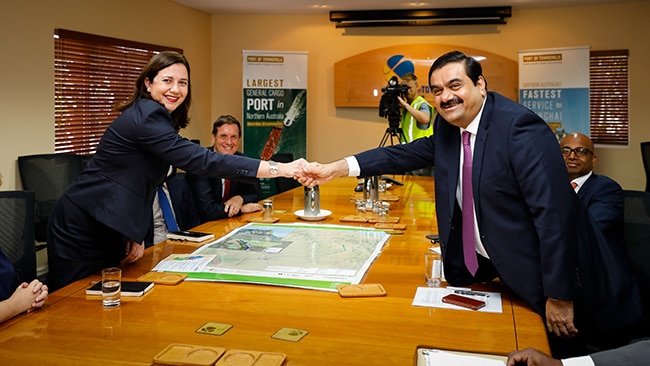 Queensland Premier Annastacia Palaszczuk welcomes Gautam Adani in a boardroom, date unknown.