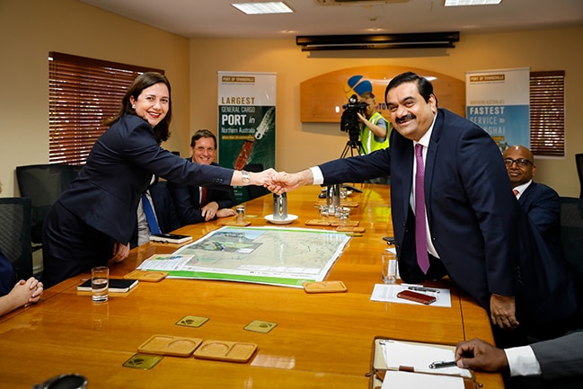 Queensland Premier Annastacia Palaszczuk welcomes Gautam Adani in a boardroom, date unknown.