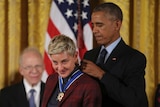 US President Barack Obama presents the Presidential Medal of Freedom to comedian and talk show host Ellen DeGeneres