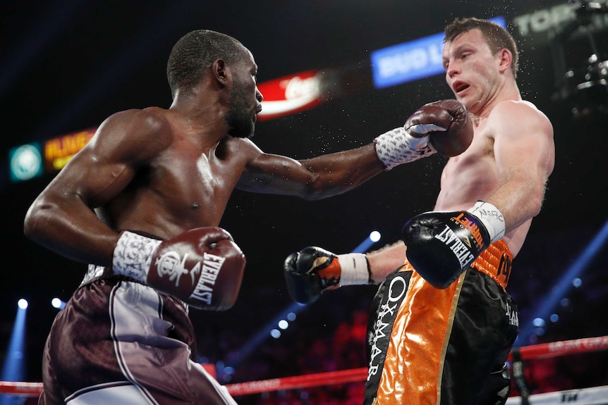 Terence Crawford lands a punch on Jeff Horn