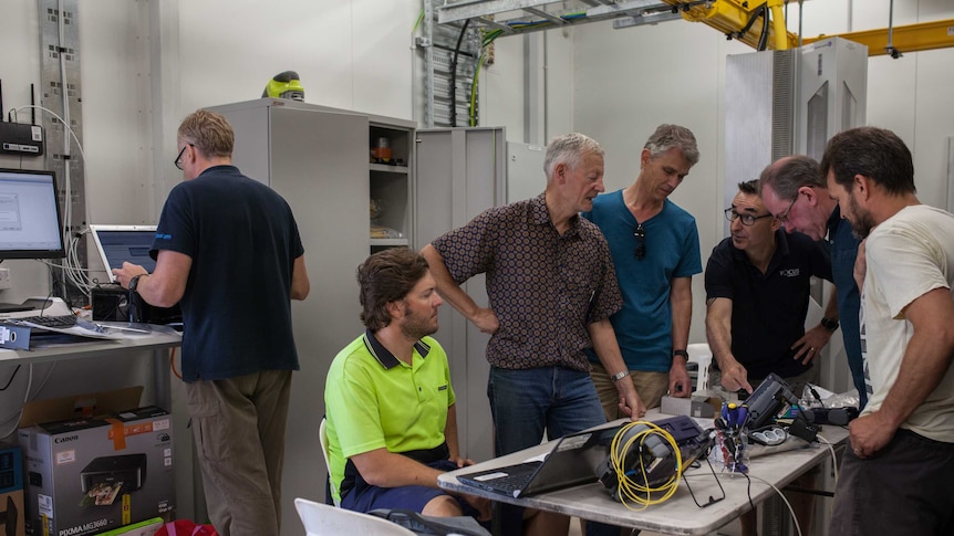Vocus Communications staff inspect a new cable landing station on Christmas Island.