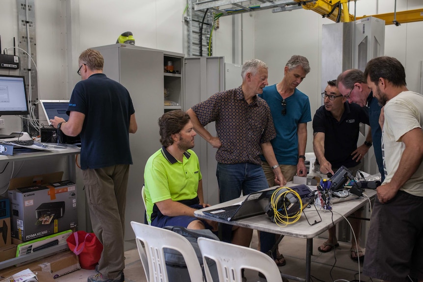 Vocus Communications staff inspect a new cable landing station on Christmas Island.