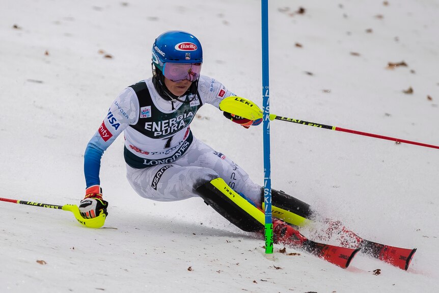 Mikaela Shiffrin skis past a slalom pole