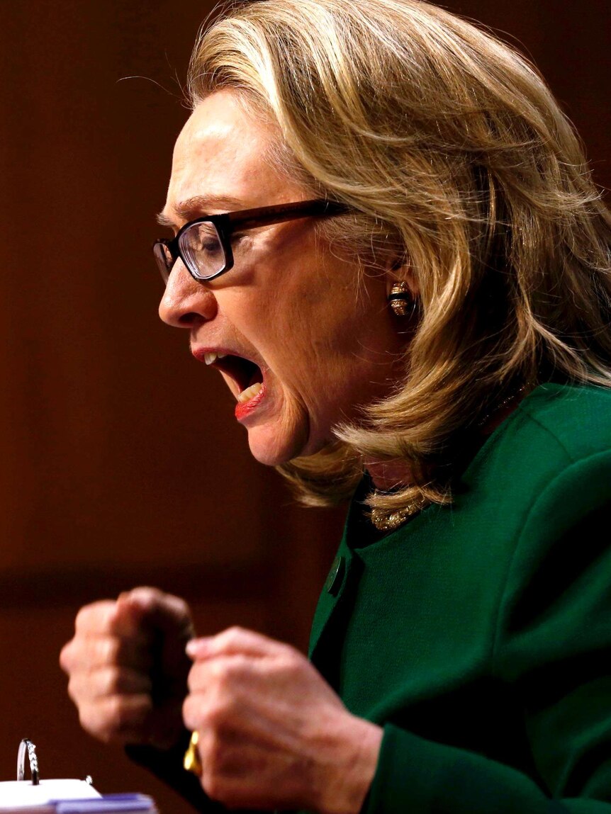 Hillary Clinton pounds her fists during hearing.