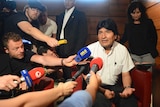 Evo Morales talks to journalists after plane diverted