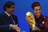 Qatari leaders including the Emir Sheikh Hamad bin Khalifa Al-Thani win the bid for World Cup 2022.