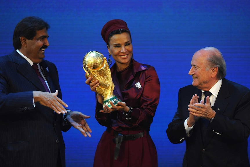 Sepp Blatter presents the World Cup Trophy to Qatar following its winning bid for the World Cup 2022.