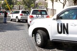 UN inspectors are transported to chemical attack scene