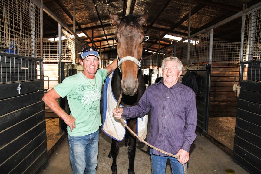 Allen Browell with his son Darren Browell in their Bendigo stables.