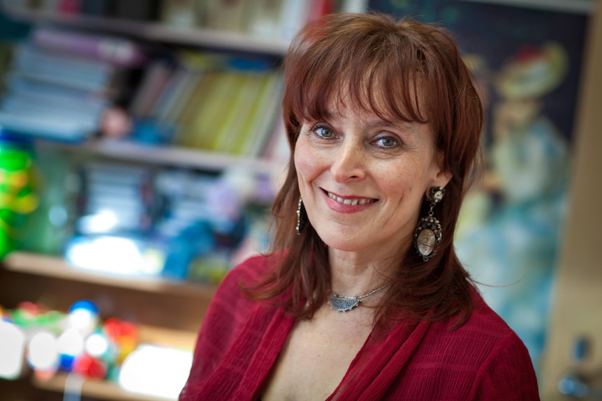 Woman looking at camera and smiling