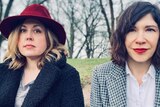 A 2021 press shot of Sleater-Kinney's Corin Tucker and Carrie Brownstein