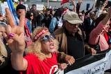 Tunisian demonstrators shout during a protest