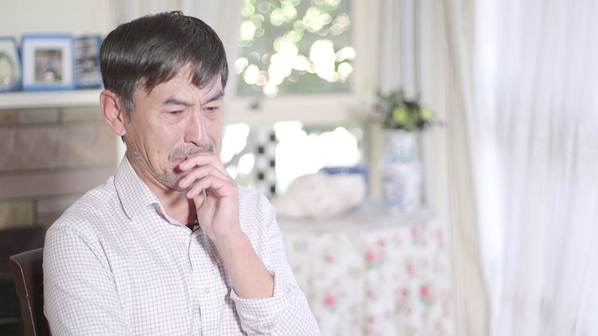 Xiaoming Li becomes tearful when he recalls his experience as a soldier during the Tiananmen massacre.