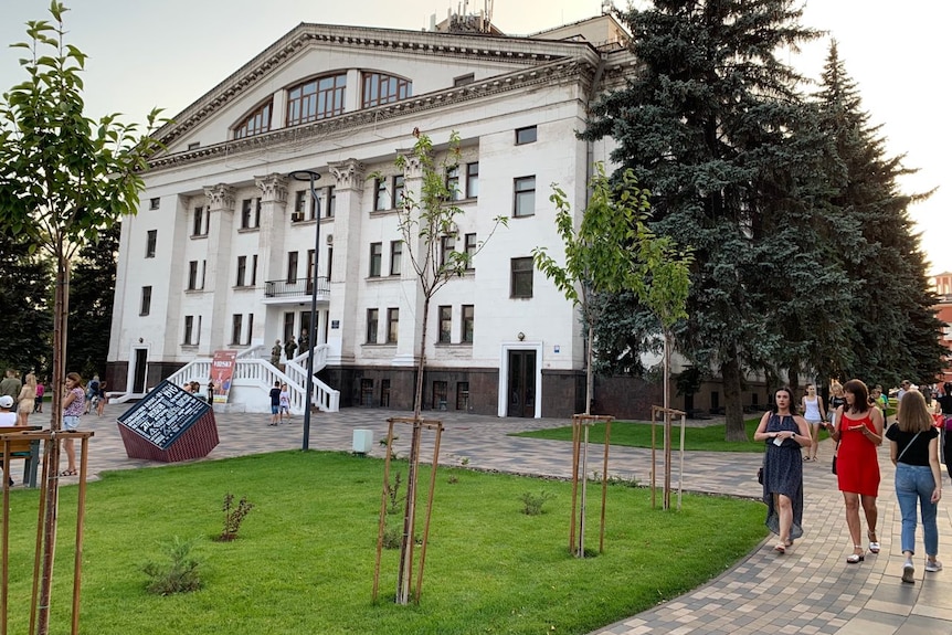 An exterior shot of a classical-style building.