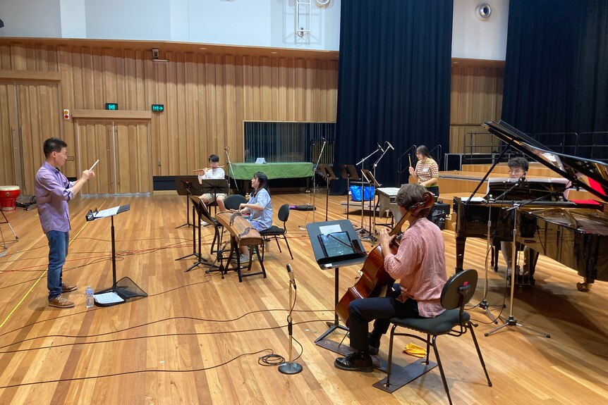 Ray Lin conducts his new work in studio