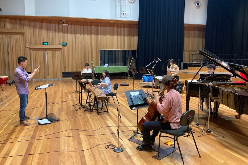 Ray Lin conducts his new work in studio