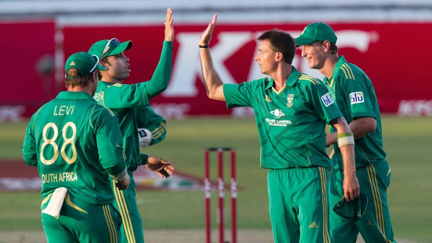 South Africa celebrates after taking the wicket of New Zealand batsman Peter Fulton.