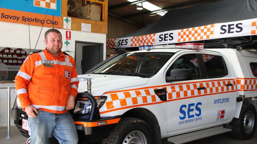 Myrtleford unit controller Jason Forber in front of SES truck