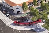 A drawing of a light rail vehicle turning a corner at a city intersection.