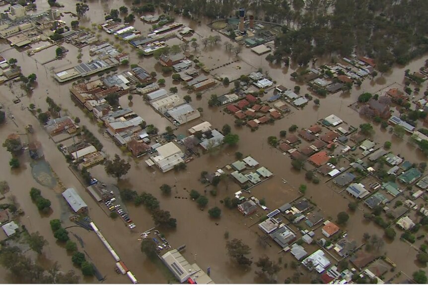 A photo from the sky of houses flooded