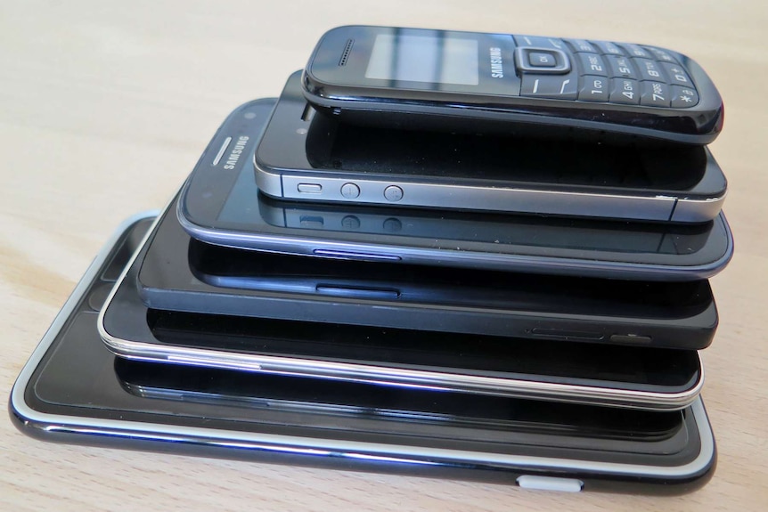 A pile of mobile phones.