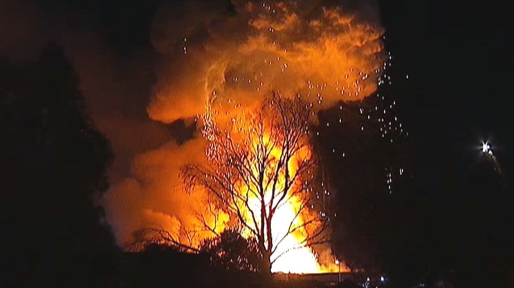 Night view of factory fire in Mitchell, Canberra