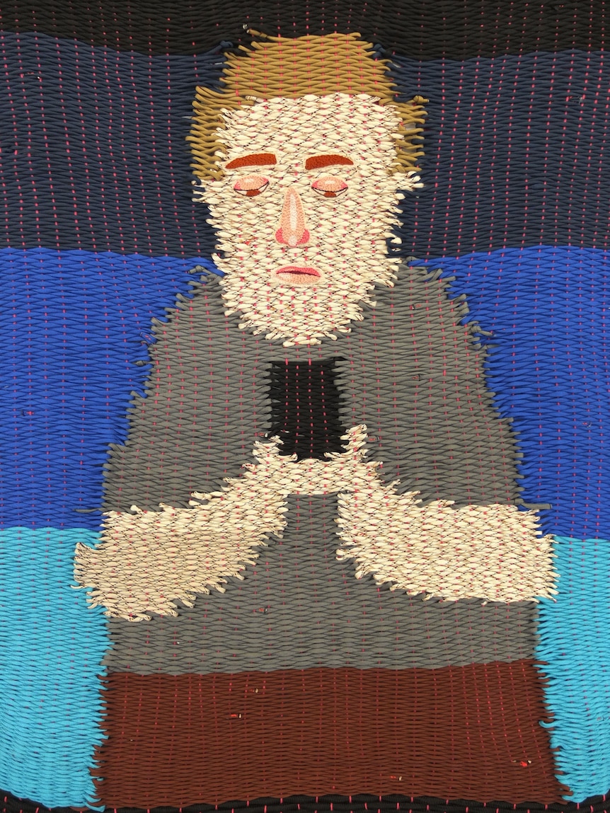 portrait of man typing on phone