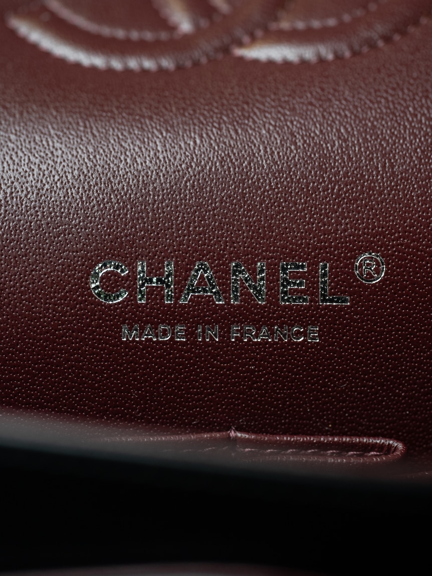The foil heat stamp on a fake Chanel bag.