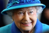 Queen Elizabeth II smiles.