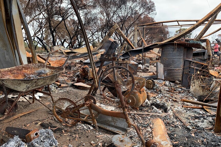 A burnt building full of random items