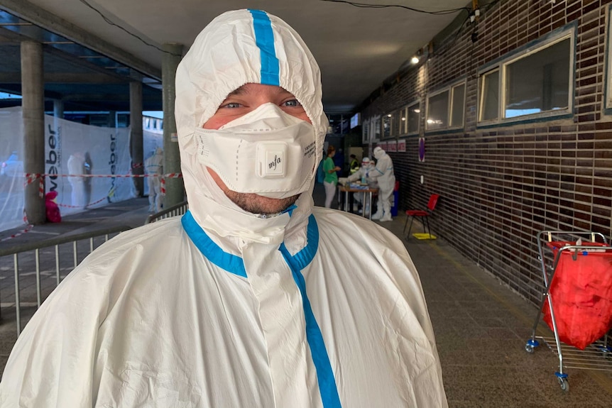 A young man in full PPE