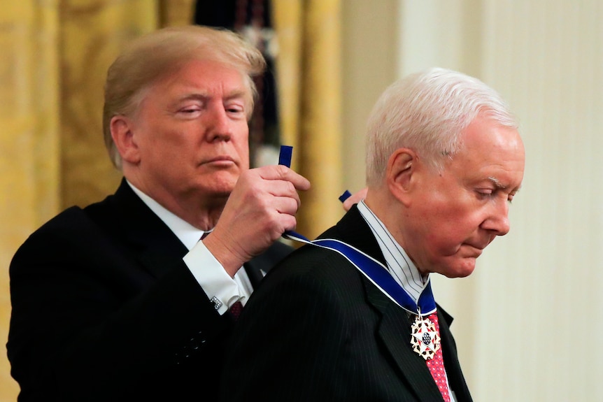 President Donald Trump conferring the Presidential Medal of Freedom to Sen Orrin Hatch, R-Utah