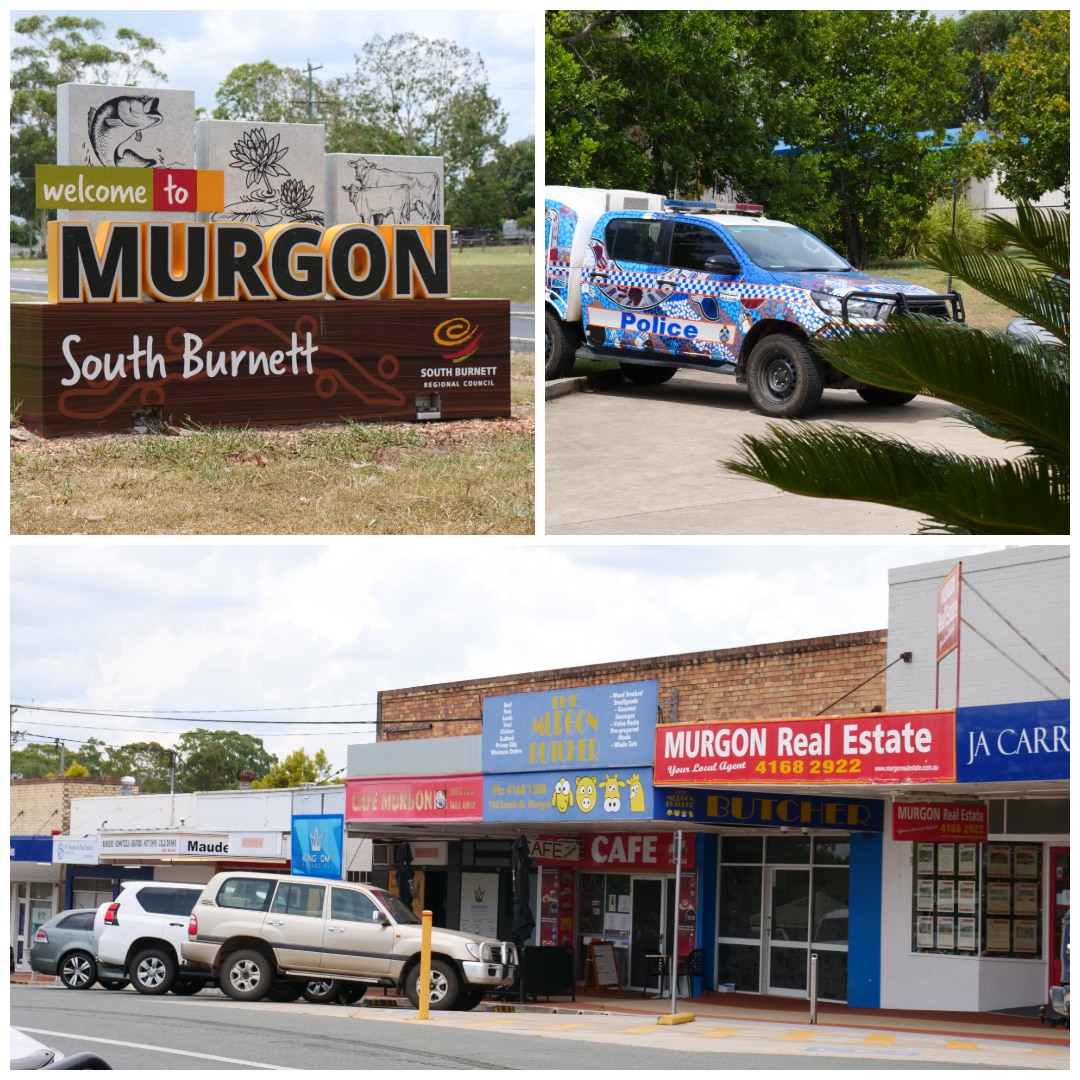 Rua principal, placa da cidade e carro da polícia em Murgon.