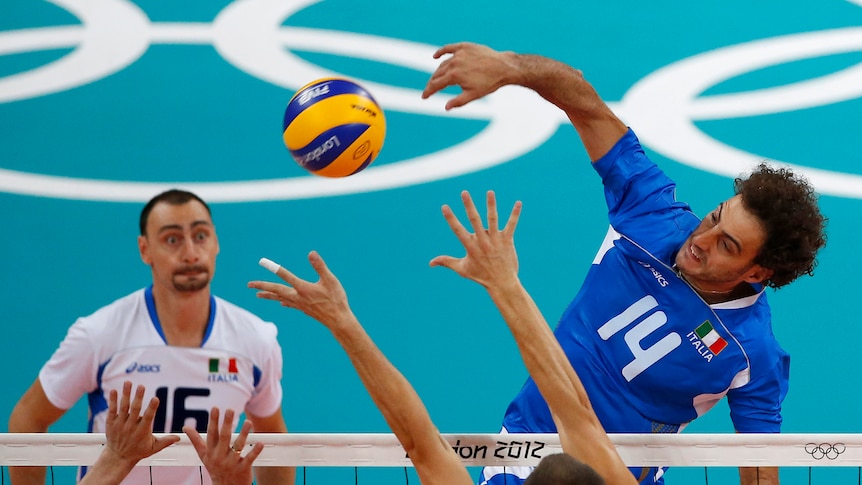 Italy spike the ball against Bulgaria