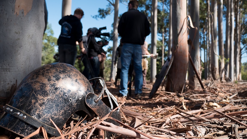 Fury Fingers film producers use a local gum forest to stage a medieval battle.