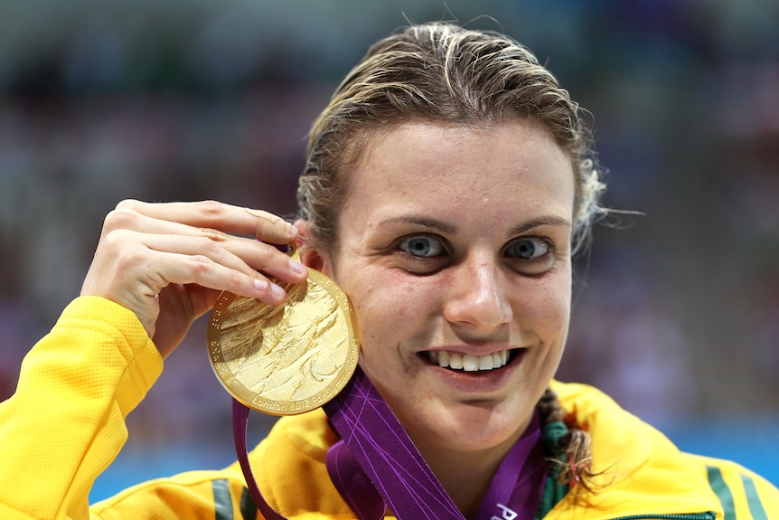 Jacqueline Freney of Australia poses after winning the S7 400m freestyle at the London Paralympics.