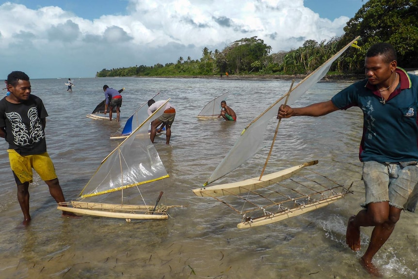 papua sailing canoes models panaeati island