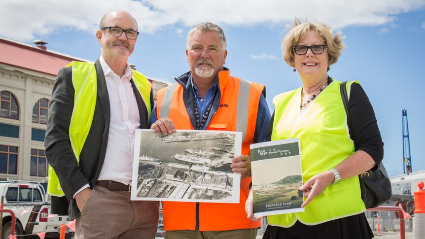 John Kelly (left), Laurie Burn, Carole Edwards (right) on Hunter Island at Macquarie Wharf, Hobart.