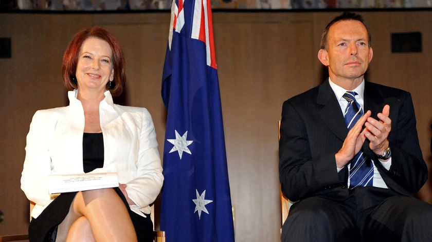 Photo finish: After an election race too close to call, Julia Gillard has pipped Tony Abbott to form government.