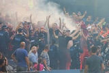 Wanderers fans let off flares at Docklands