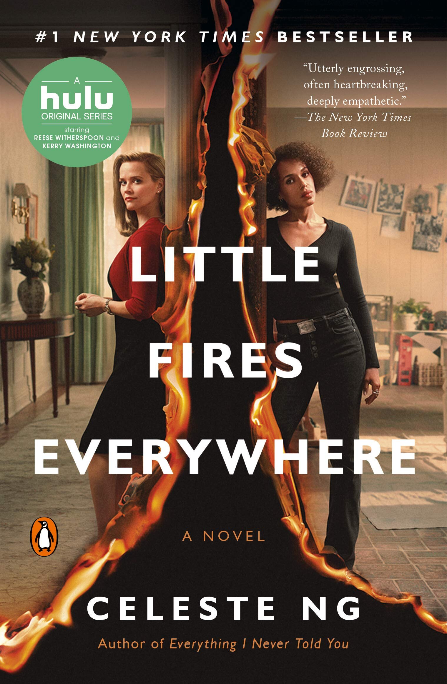 The series tie in book cover featuring Reese on the cover with Kerry Washington which flames decorating the page.