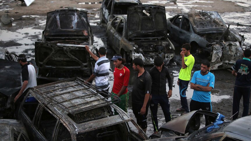 Two bombs at Baghdad car dealerships